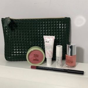 Black Makeup Bag with High-End Makeup Samples